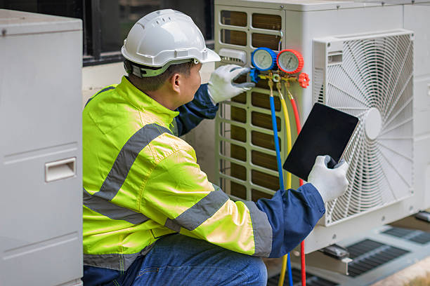 Professional Air Duct Cleaning technician working in Monmouth, OR